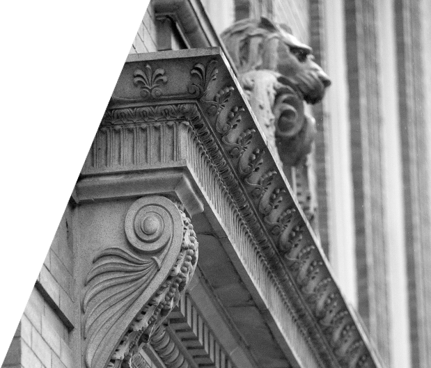 Decorative architectural elements of Vendi’s office exterior, 包括石狮头和华丽的外部架子