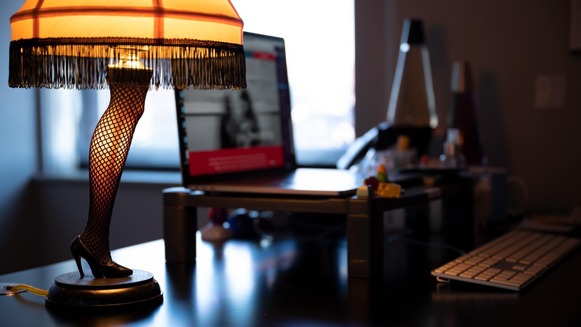 Closeup of a reproduction of the leg lamp from A Christmas Story on a desk at Vendi Advertising